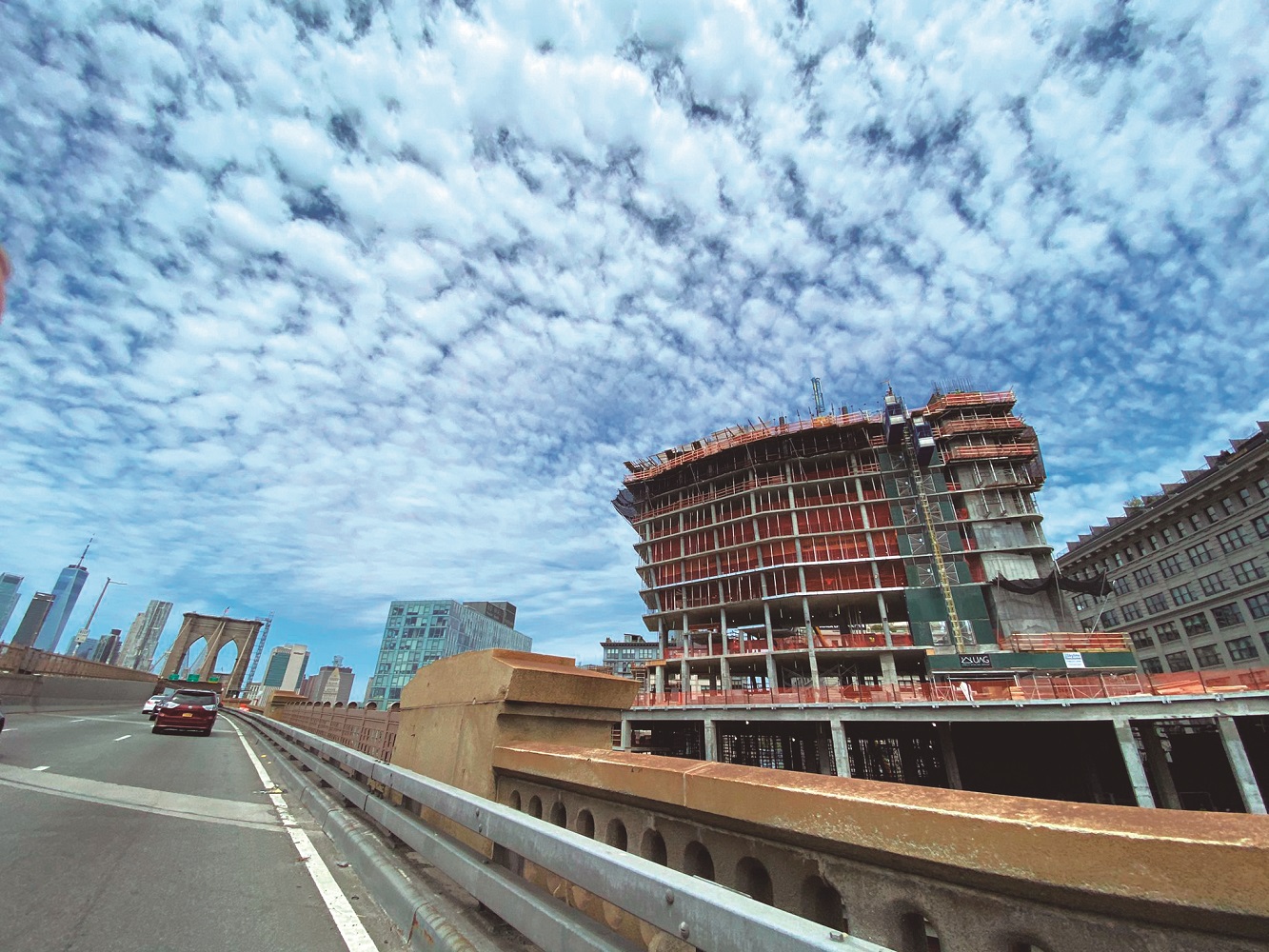 Convex Mixed‐Use Building Rises Next to The Brooklyn Bridge