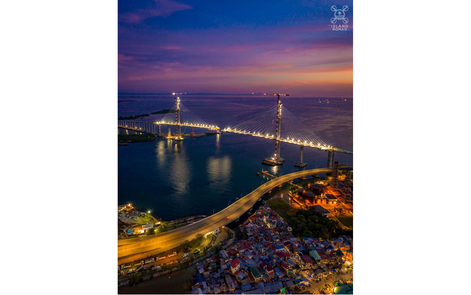 Two Comansa 21LC660 tower cranes are being used in the construction of the cable-stayed bridge that will join Cebu City and Cordova in the Philippines. <br> Image source: COMANSA