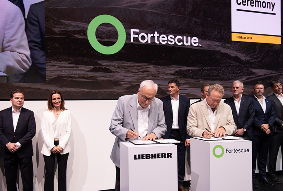 Dr Willi Liebherr of Liebherr and Dr Andrew Forrest of Fortescue officially signing the deal between the two companies.