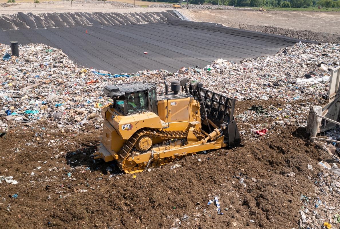 The Cat D8 Waste Handler configuration includes a specialized cab and guarding throughout the machine to take on the demands of landfill work.