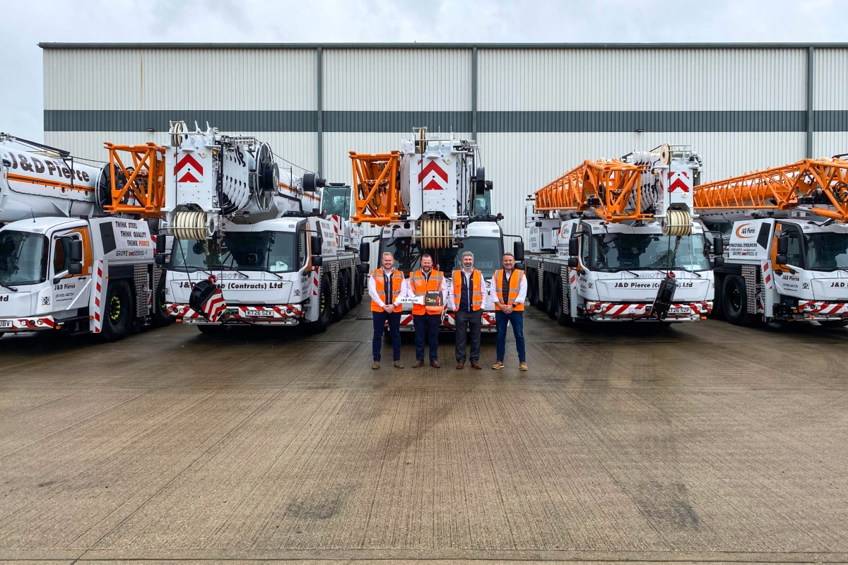 Left to right: Fraser Pierce, Jamie Pierce, and Dave Ryan from J&D Pierce with Derek Kidd of Manitowoc.