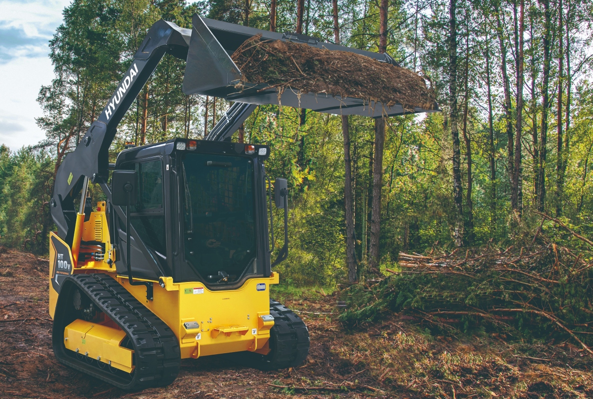 The Hyundai HT100V compact track loader has a rated operating capacity of 2,300 pounds (1,220 kg), and its heaped bucket capacity is 0.58 yd3 (0.44 m3).
