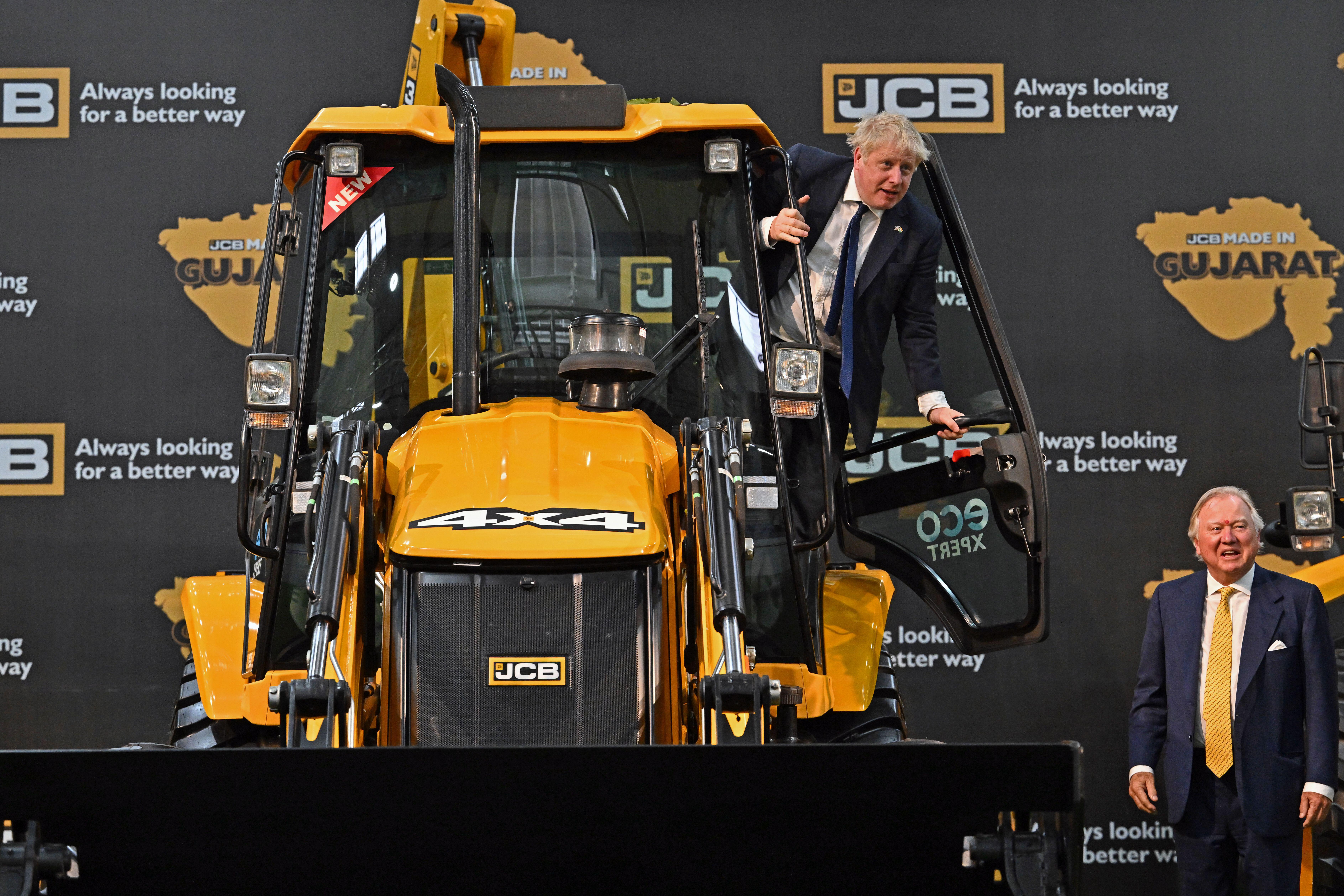 Prime Minister Boris Johnson pictured with JCB Chairman Lord Bamford at JCB India’s new £100 million factory in Gujurat.