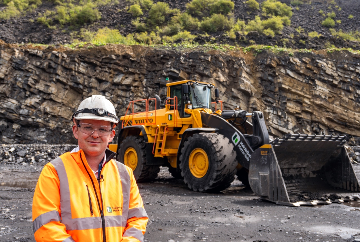 Heidelberg Materials’ UK fleet manager Luke Morgan and the rebuilt Volvo L350F.