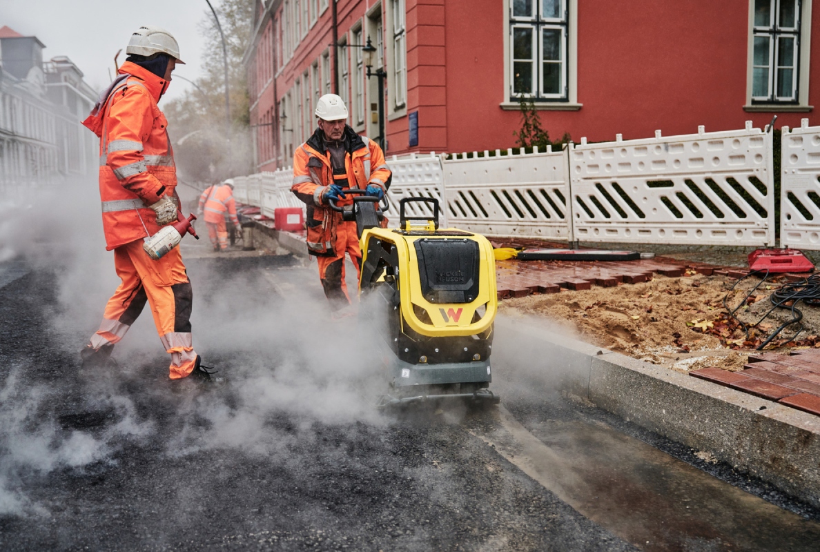 New on the market is the Wacker Neuson DPU62 vibratory plate, shown here performing compaction of asphalt for a new roadway.