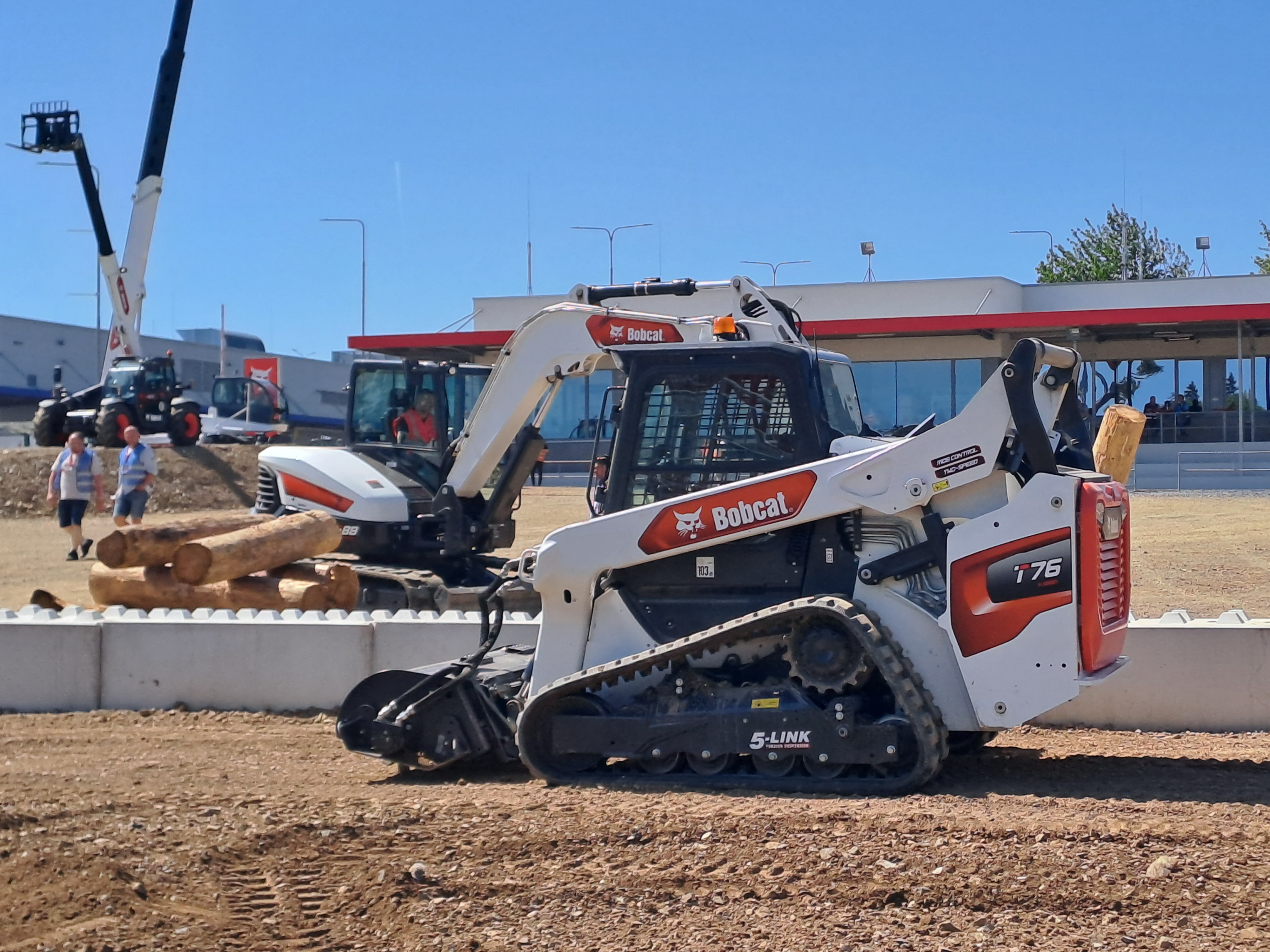 Bobcat T76 compact track loader displays its traction and stability in rough terrain