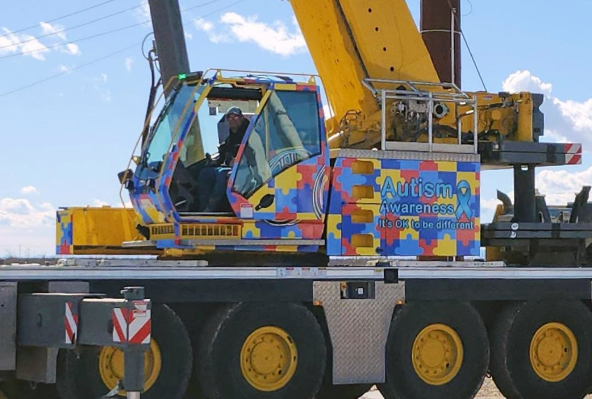 Nimble Crane to shine light on Autism Awareness Month with vibrant crane wrap