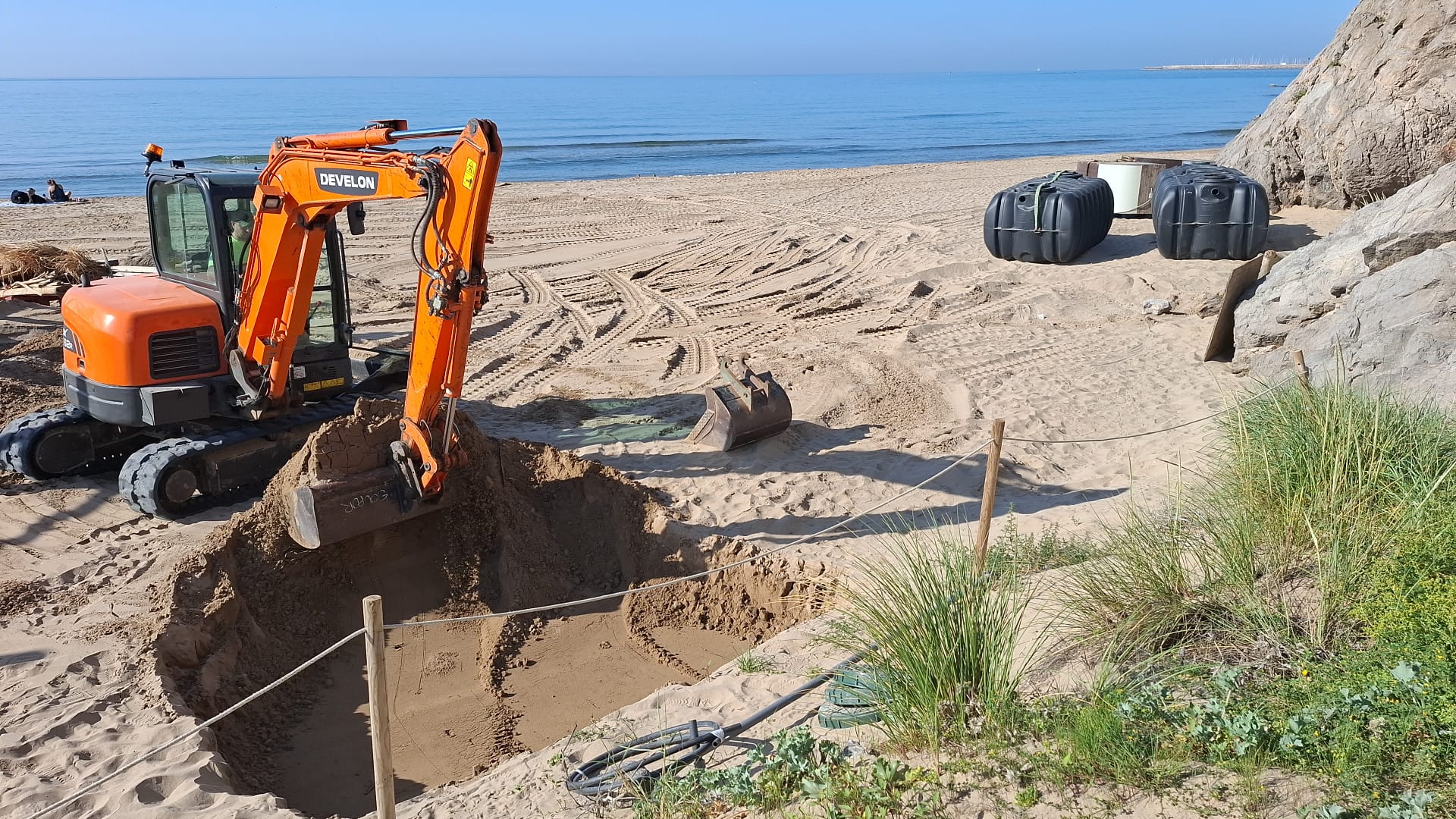 Develon DX62R Mini-Excavator Prepares Coastal Resort for Summer Season