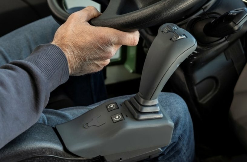 Joystick (can be plugged into the right armrest of the driver's or passenger seat)