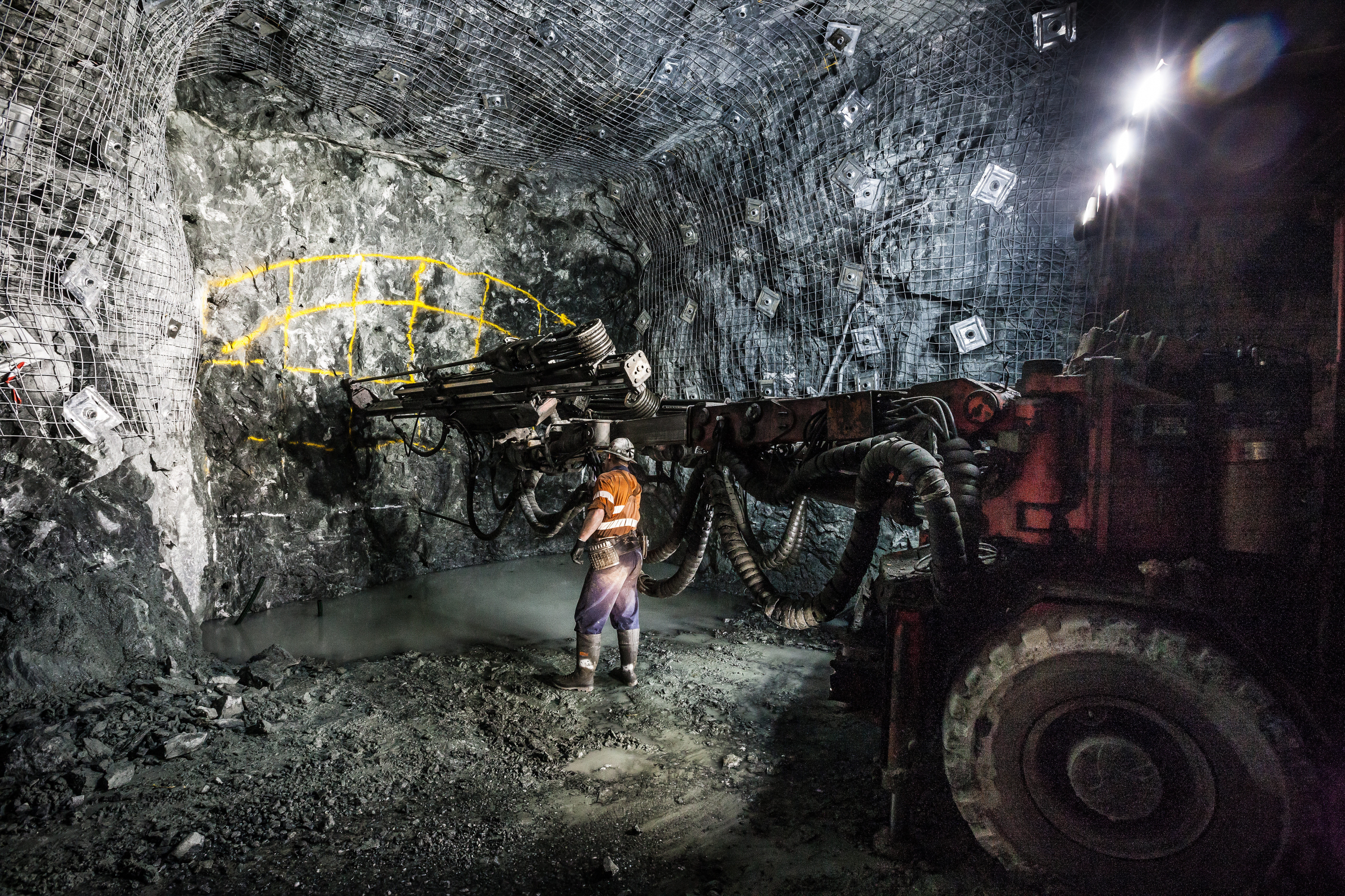 Mining machinery at work in a confined underground