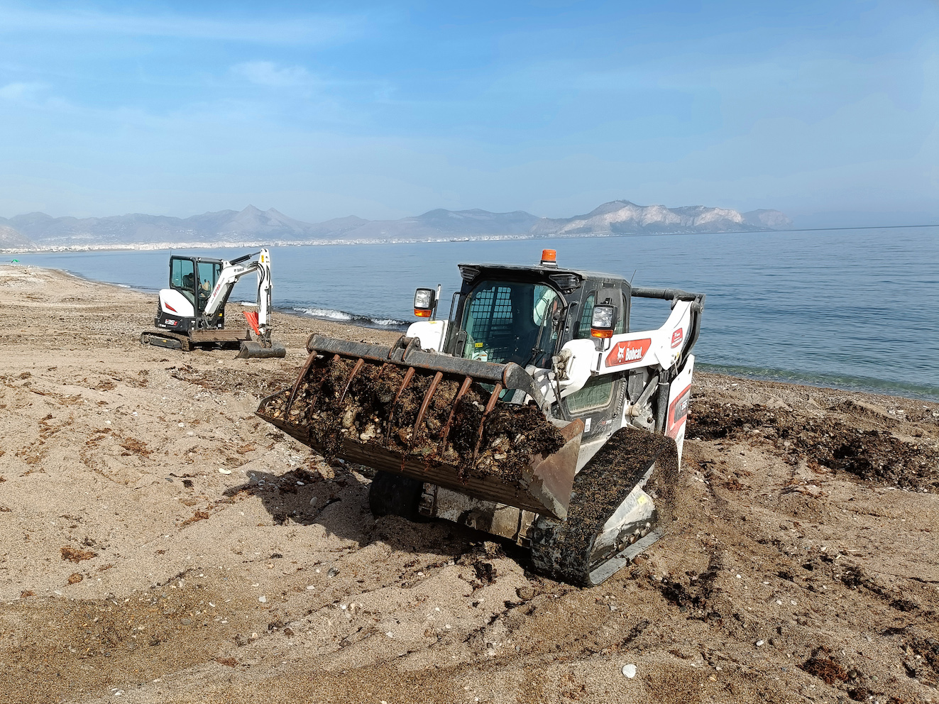 Bobcat T66 and E35z at Bagheria Beach