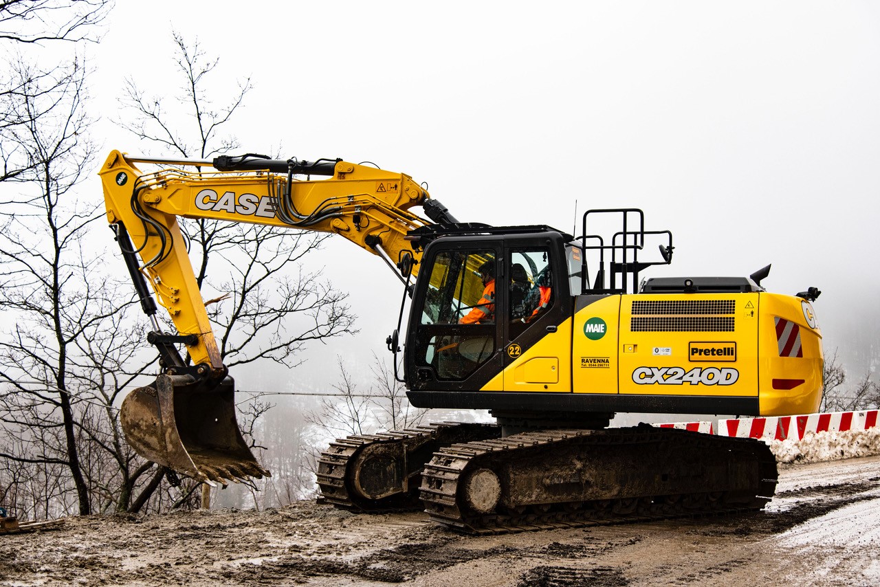CASE CE CX240 works to rebuild and strengthen a site in the aftermath of a landslide at Bocca Trabaria