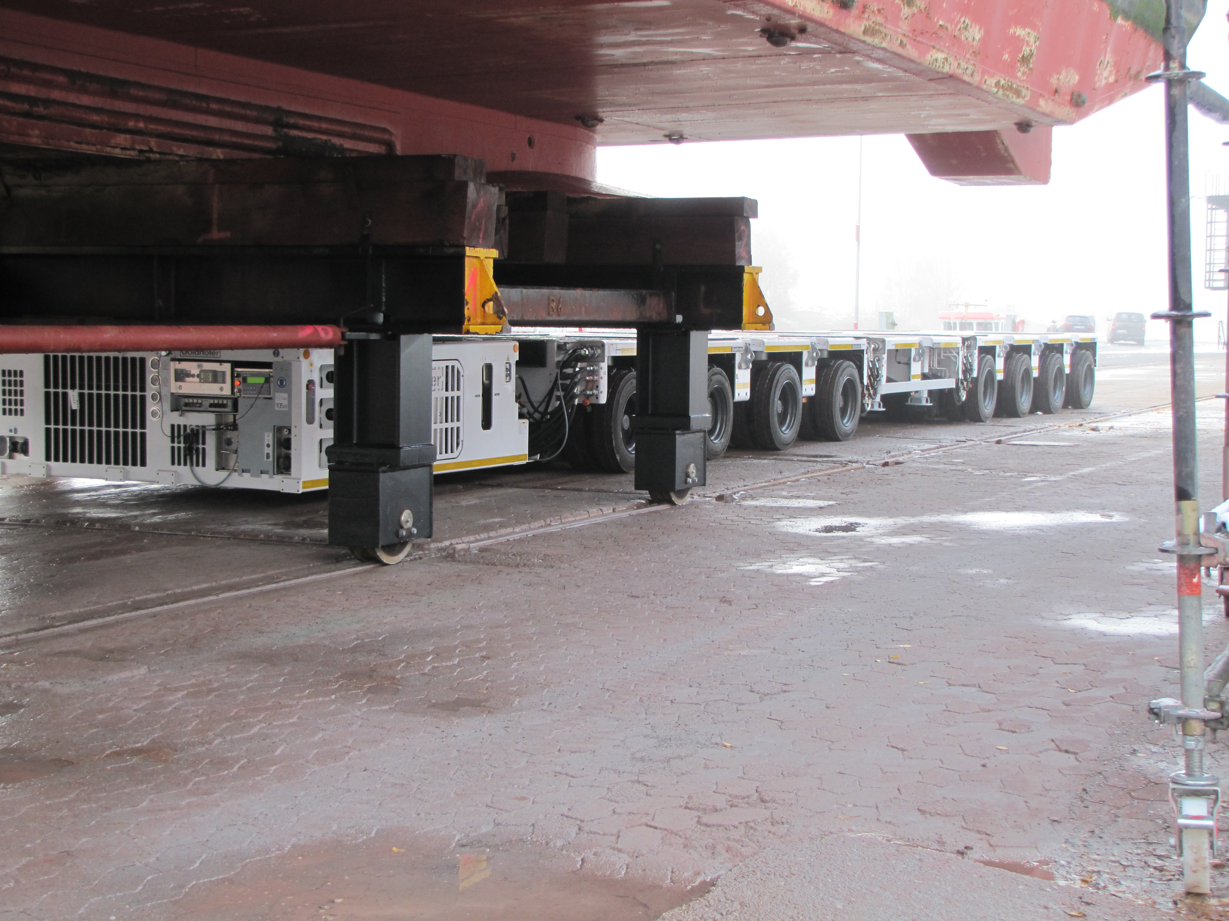 The self-propelled transporter ready for positioning under the upper cradles prior to the hydraulic pick-up