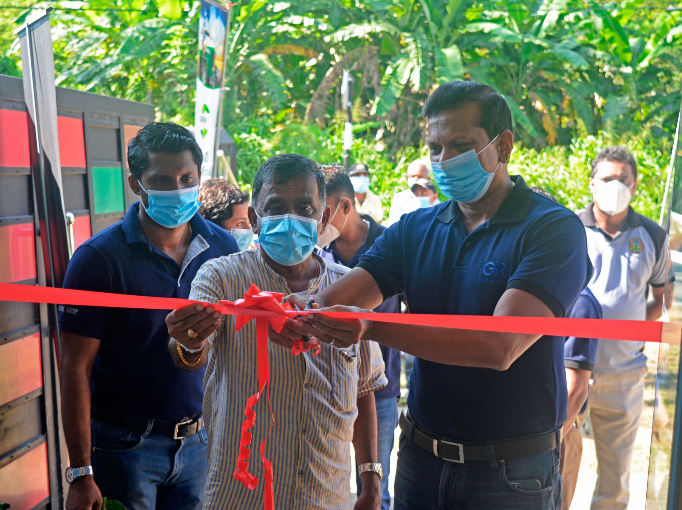 GRI CEO cutting the ribbon