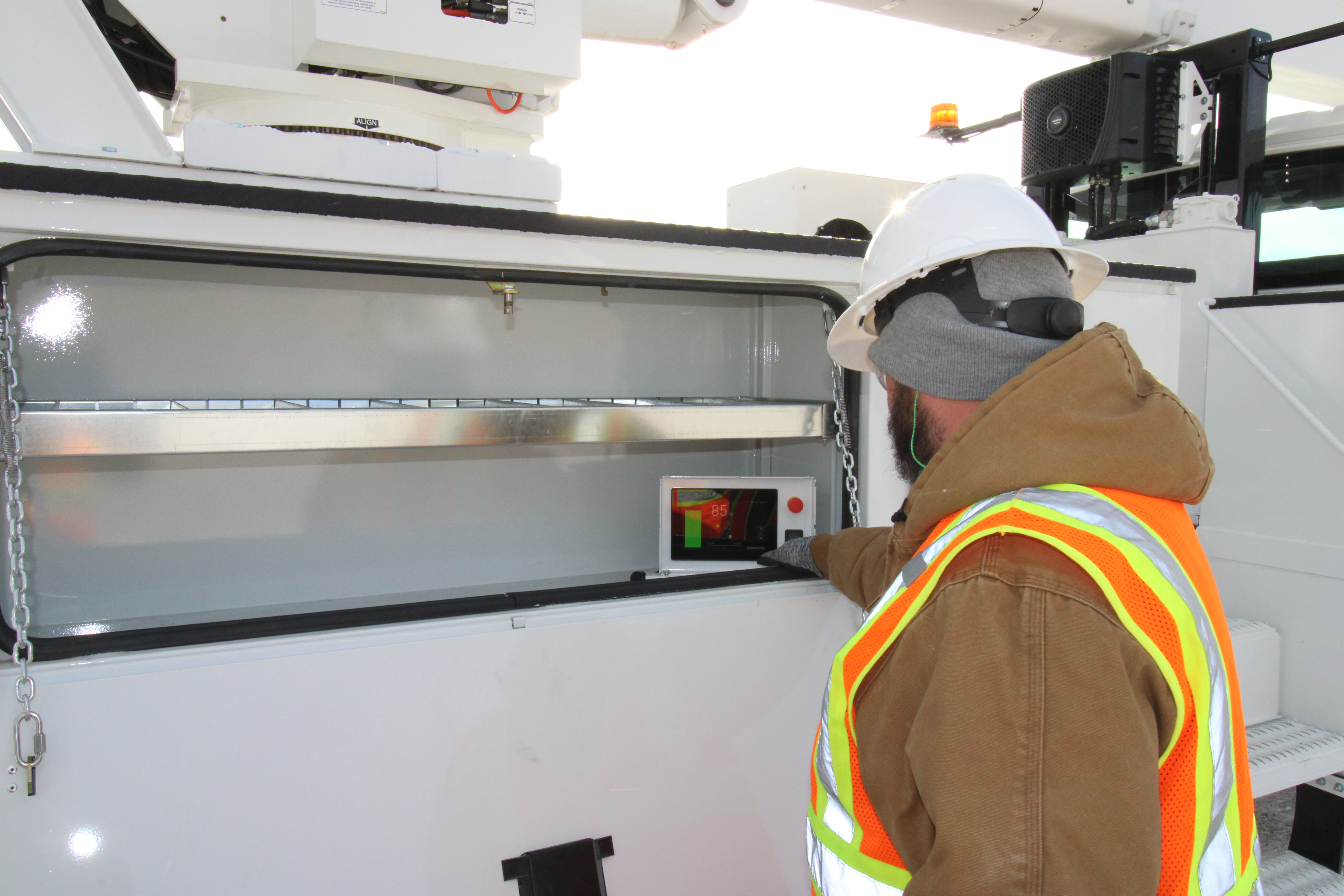 A touch screen displays settings, battery charge, system statistics such as gallons of fuel saved, run time, and other notifications.
