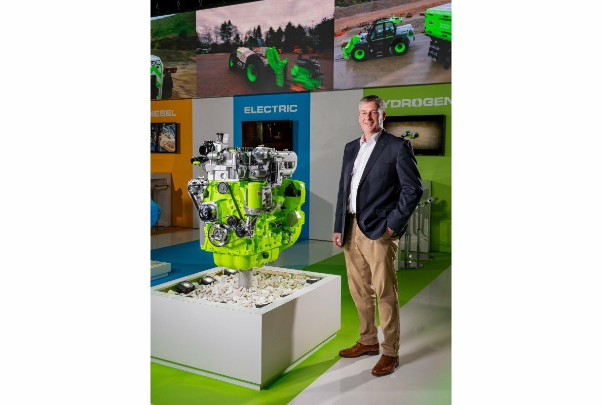  JCB Chief Innovation and Growth Officer Tim Burnhope with the JCB hydrogen engine at Conexpo2.