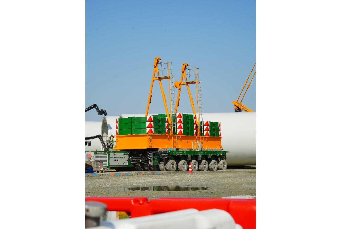 Additional Ballast is being carried with an SMTP transporter to speed rigging the crane for heavy lifts.