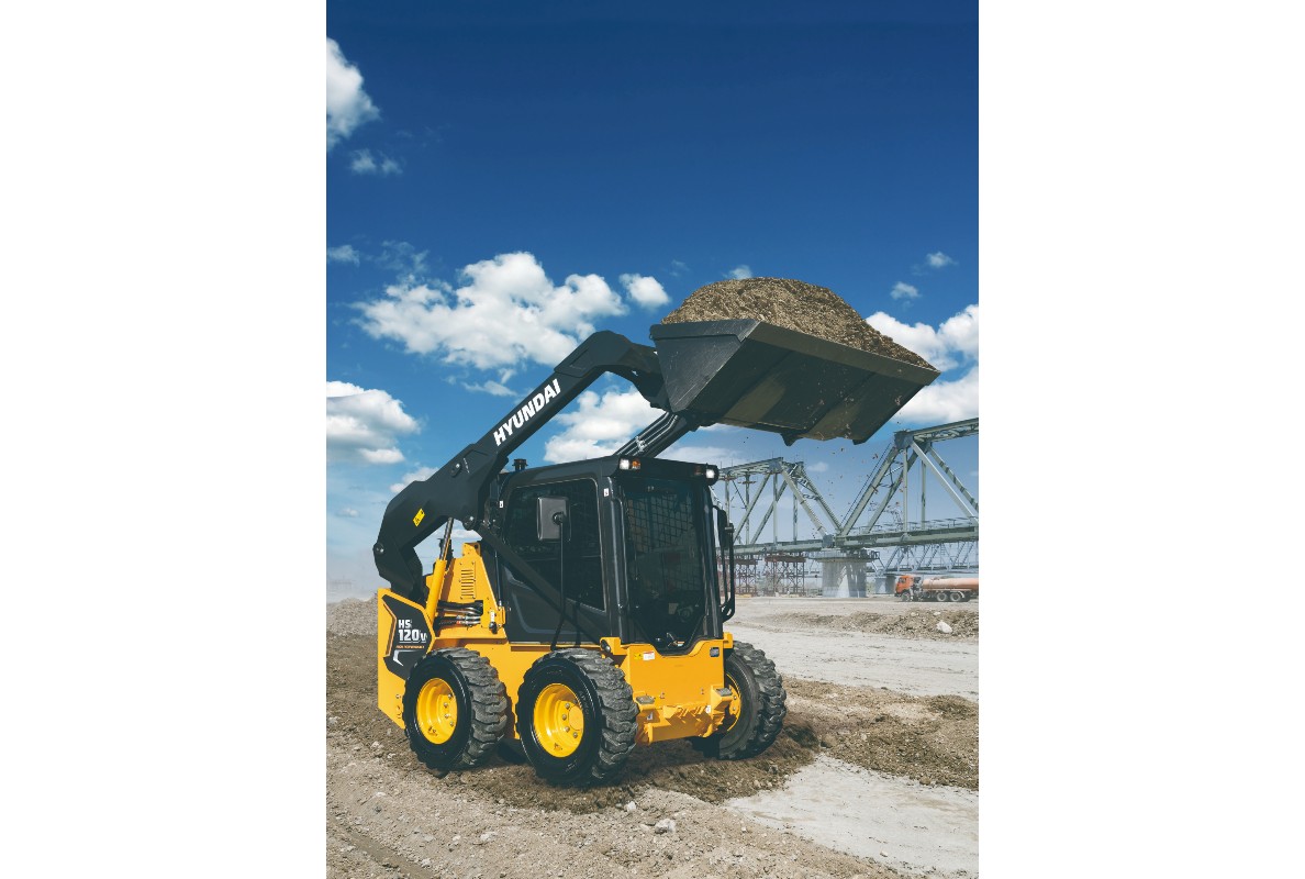 The Hyundai HS120V skid steer loader has a rated operating capacity of 2,690 pounds (1,220 kg), and its heaped bucket capacity is 0.58 yd3 (0.44 m3). 