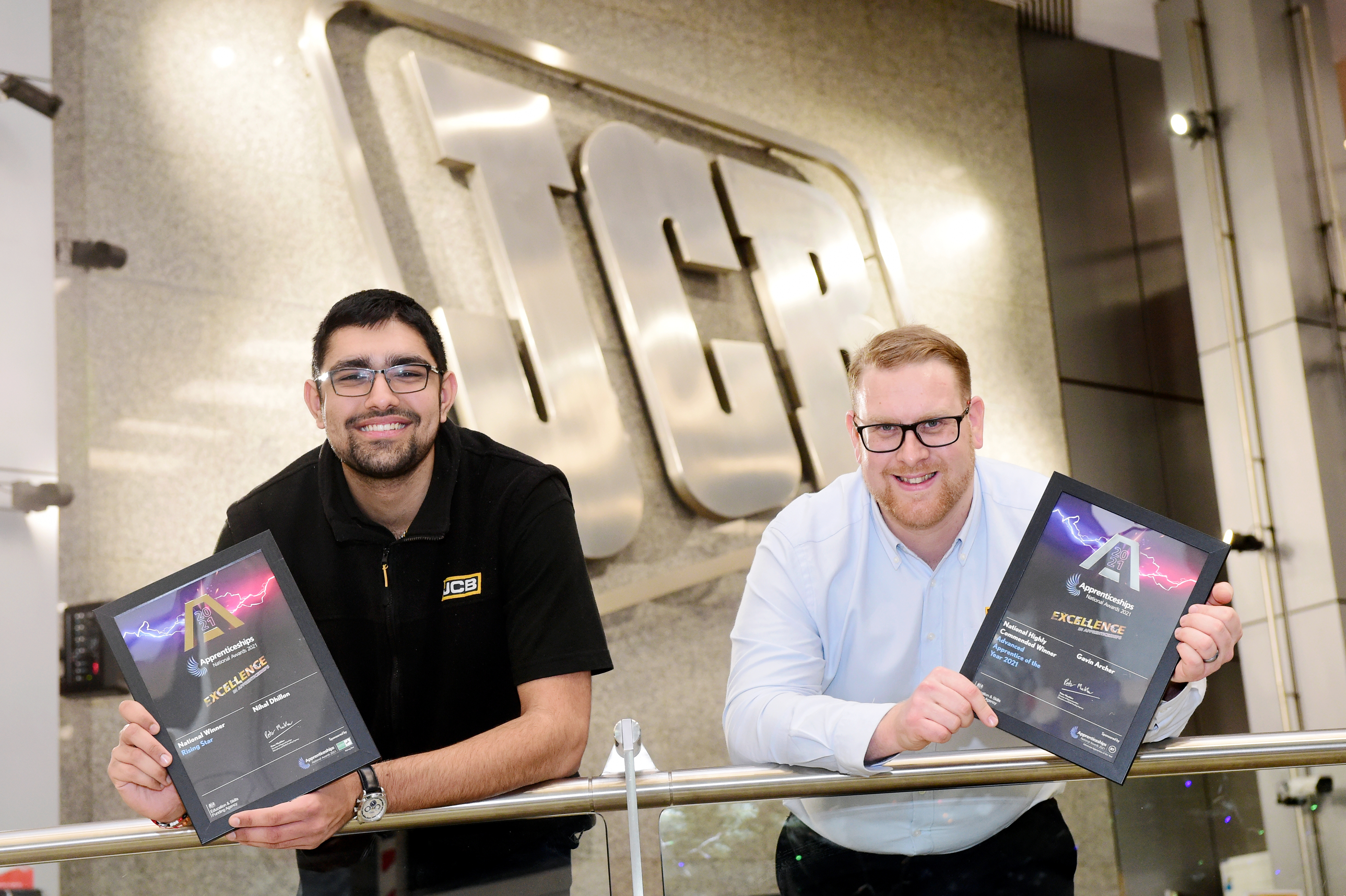 JCB Engineering Apprentice Nihal Dhillon (left) celebrates his Rising Star of the Year award at the National Apprenticeship Awards. He is pictured with Gavin Archer who was Highly Commended in the Advanced Apprentice of the Year category.