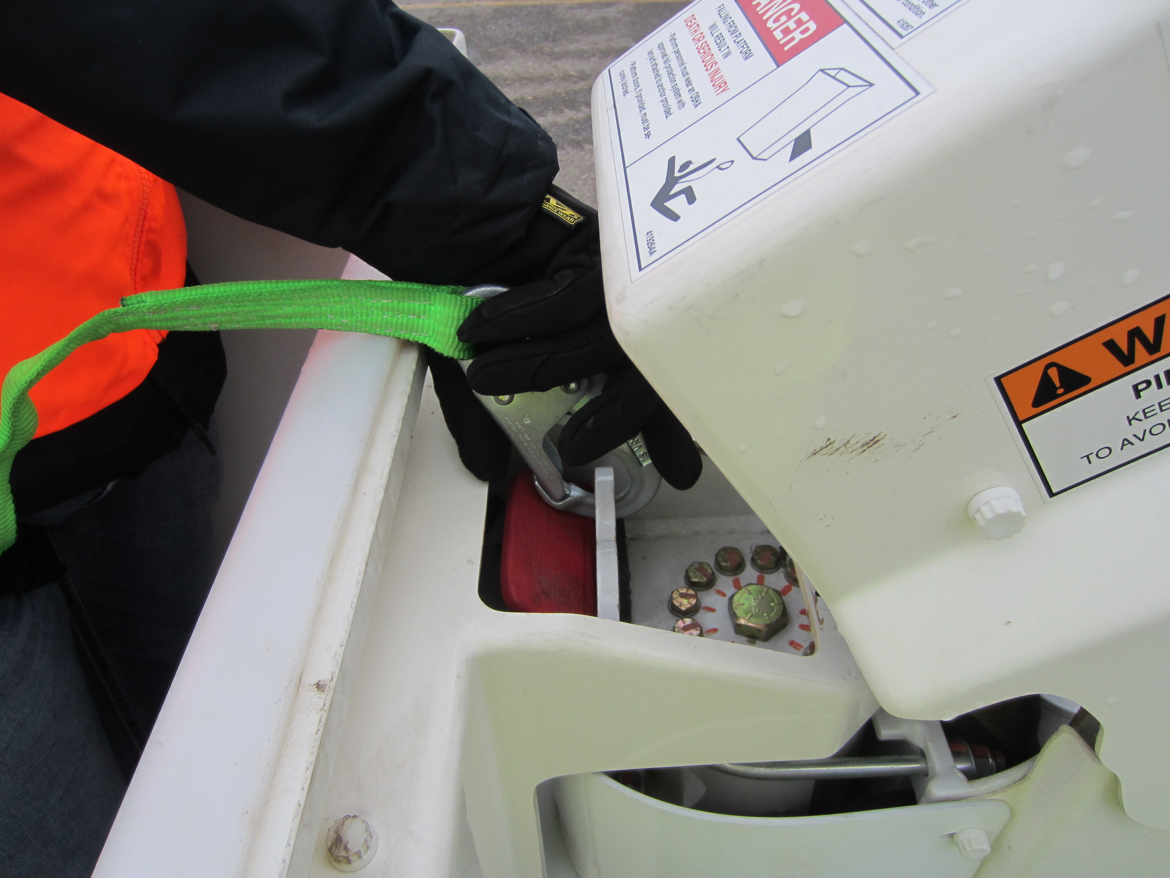 The PAL in the Bucket is designed to reduce the chance of an operator elevating the bucket without a lanyard attached.