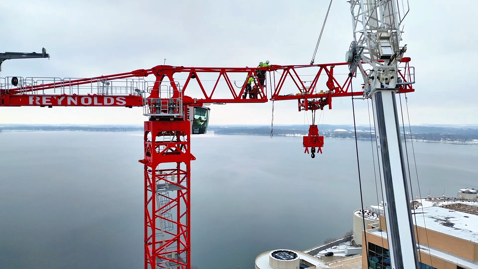 Potain tower cranes help transform Madison’s downtown skyline under an airport flight path