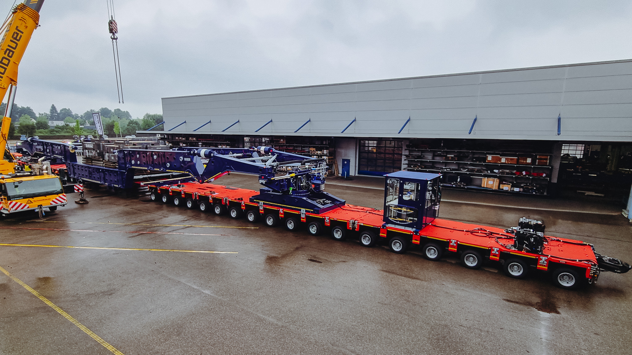 36 Goldhofer THP/SL-L axle lines in combination with a Greiner girder bridge for Collett & Sons 