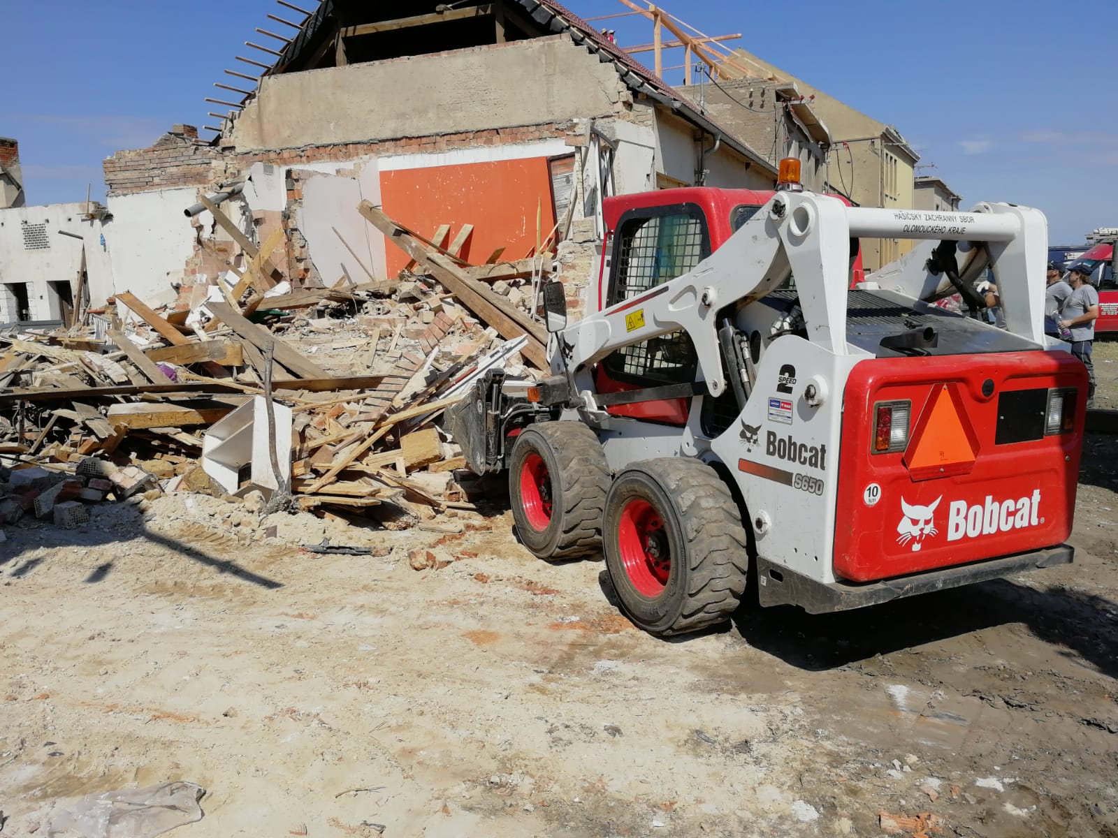 Tornadoes or Flash Floods - Bobcat Loaders Aid Firefighters