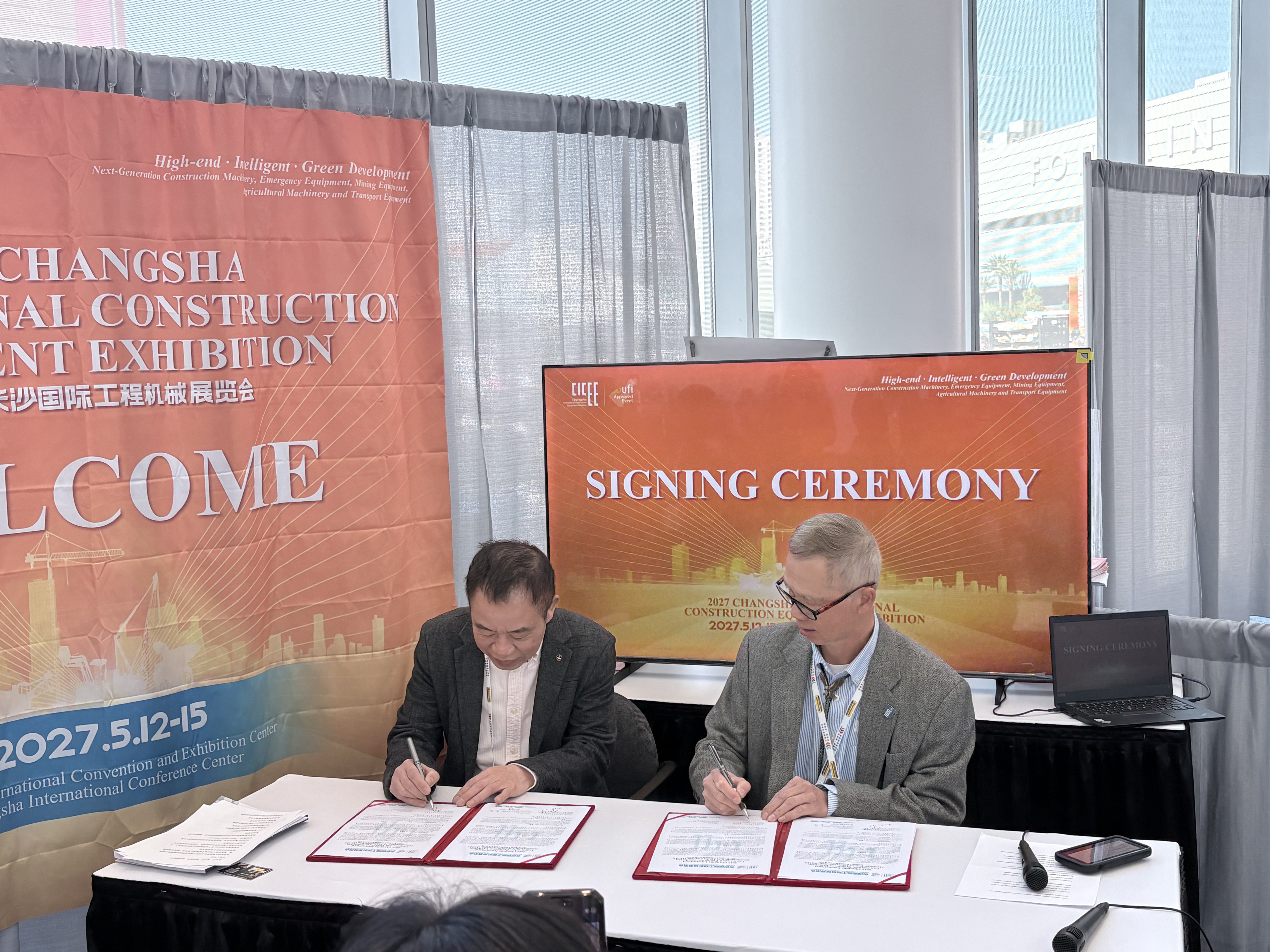 signing with the International Society for Intelligent Construction