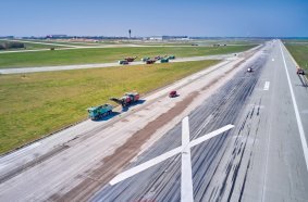 350,000 metric tons of extremely hard concrete were removed at Leipzig/Halle Airport using a total of 15 Wirtgen cold milling machines.