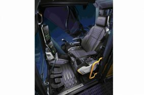 The cabin is air-conditioned, very spacious, and equipped with large displays.