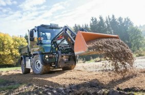 Unimog implement carrier with front loader