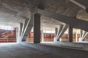 The truss frame within the second floor ensured that the conference hall below could be free of columns.