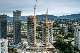 A 280 HC-L and a 355 HC-L from Liebherr are helping to build two residential towers in Burnaby, Canada.