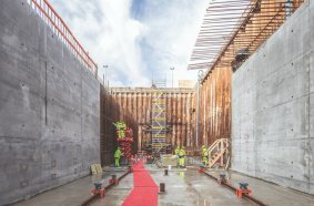 The tunnel is being constructed using the cut-and-cover method, with the bottom plates, walls and slabs being concreted in succession across 54 sections.