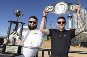 Tom March (right) from England won the inaugural Caterpillar Global Dealer Technician Challenge.