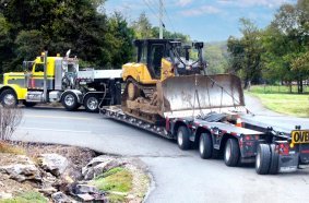 The STZ-VL4 (3+1) lowboy trailer with flip axle