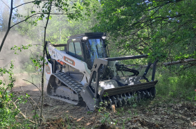 T86-2 track loader equipped with a forestry cutter