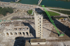 World's largest duty cycle crane in demolition works with 10 t wrecking ball at a height of 75 m.
