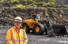 Heidelberg Materials’ UK fleet manager Luke Morgan and the rebuilt Volvo L350F.
