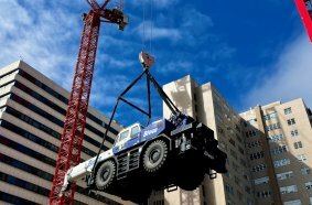 The cranes even lowered a mobile crane weighing approximately 38 tons into the basement level.