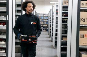Hiab warehouse worker with spare parts