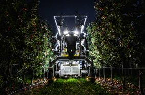 The advanced farm BetterPick robotic harvester picks fruit at night.