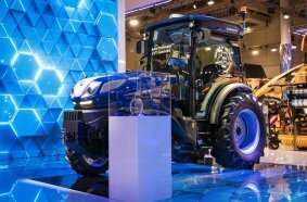 The TOTY 2026 Specialized award on the stand with the New Holland T4.120F Auto Command