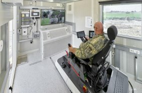 Everything safely in view: The Liebherr PR 726 Crawler Dozer can be controlled with LiReCon under teleoperation from the control station in the container.