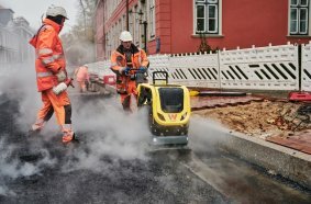 New on the market is the Wacker Neuson DPU62 vibratory plate, shown here performing compaction of asphalt for a new roadway.