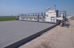 Spraying a curing compound