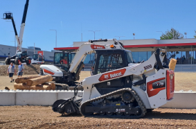 Bobcat T76 compact track loader displays its traction and stability in rough terrain