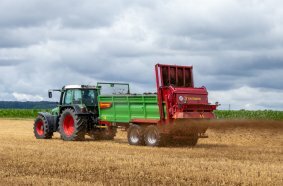 Foldable attachments and universal spreader with cardan drive for versatile use