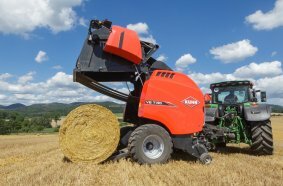 KUHN VB 7100 first round balers with weighing system  on bale kicker