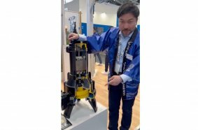 Hiroyuki Naruse from Tsurumi pointing to the unique cutting unit of the new CZ pump: a brutal shredder designed to make even stubborn fibres flow.